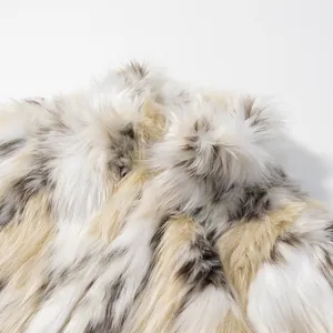 Detailed macro view of white and grey mixed faux fur texture on a warm winter jacket