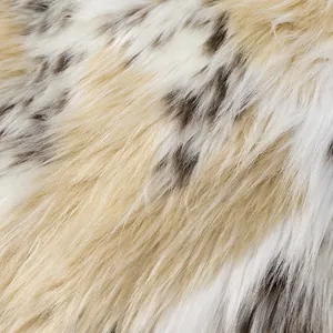 Detailed macro view of high-quality animal print faux fur texture in white and brown tones