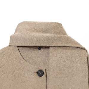 Vintage camel wool blend coat with wide lapels and black buttons for women's winter style