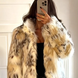 Faux fur coat for women with stylish spotted pattern and long sleeves in ivory brown