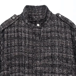 Women's black and white tweed bomber jacket with metallic buttons and military accents