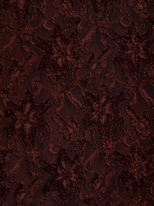 Close-up of exquisite burgundy lace fabric with vintage floral velvet texture and mesh detail