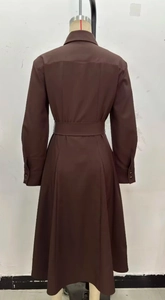 Back view of a long-sleeved brown shirt dress featuring a wide belt and A-line skirt