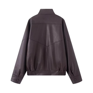 Detail view showing back of dark brown leather jacket with V-shaped stitching and texture