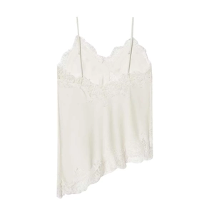 Close-up of cream lace camisole top featuring silk fabric and eyelash lace trim details