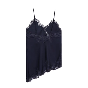 Detailed view of navy silk camisole with delicate lace trim and asymmetrical hem