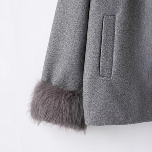 Women's chic grey wool coat with elegant faux fur cuffs and minimalist side pocket design