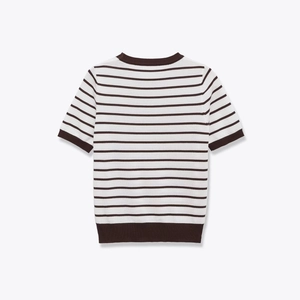Detailed close-up of striped knit top showing the ribbed crew neck and fine knit texture