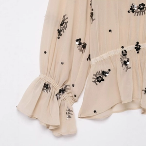 Beige sequin floral chiffon blouse with sheer fabric and ruffled cuffs for women