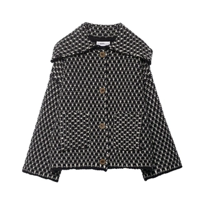 Women's chic black and white tweed knit cardigan jacket with lapel and wood buttons