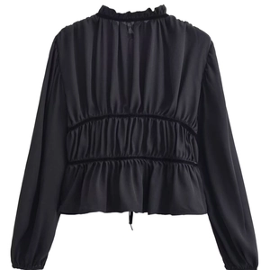Elegant black long-sleeved women's blouse with shirred back and ruffled stand collar