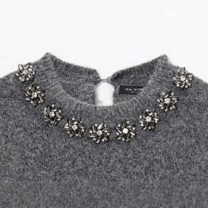 Elegant grey knit sweater for women with crystal flower embellishments on the neckline