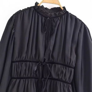 Women's vintage black long sleeve blouse with bow neck and velvet pleated details