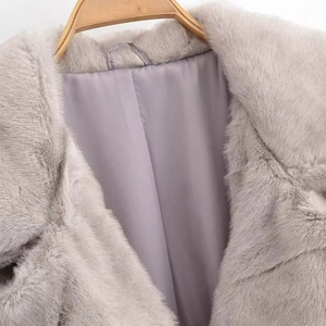 Detail of grey purple faux mink coat showing thick fur collar and smooth satin lining