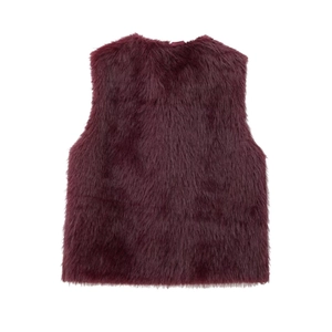 Close-up of deep purple faux fur vest showing luxurious long-hair plush texture