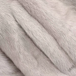 Luxurious faux mink fur coat for women featuring a plush lavender grey long-sleeve design
