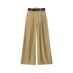 Detail of champagne gold wide leg trousers with pleated satin fabric and leather belt