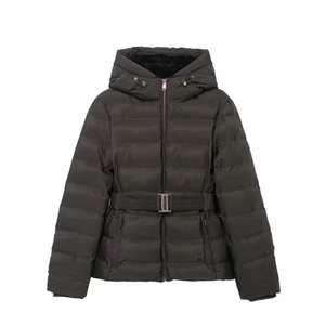 Detail of black hooded jacket featuring adjustable waist belt and quilted pattern