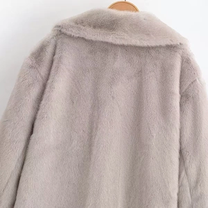 Plush faux mink fur coat in grey featuring a large collar and long sleeves on a hanger