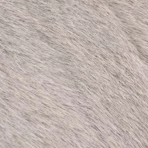 Close-up macro view of high-quality light grey faux mink fur texture with natural gloss