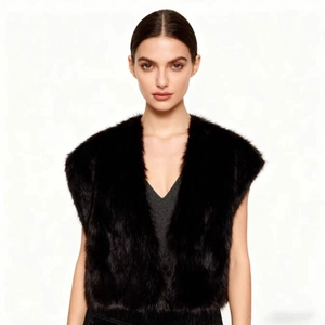 Women's faux fur vest in black, sleeveless cropped style for autumn and winter outfits