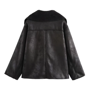 Back view of a black faux shearling moto jacket showing seam details and suede texture