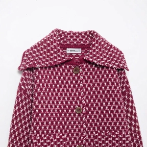 Women's red and white knit cardigan with lapel collar and vintage button closure