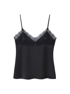 Detail of black satin camisole featuring delicate eyelash lace trim and thin straps