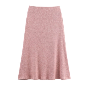 Detail of pink rib-knit midi skirt showing soft texture and high-waisted elastic design