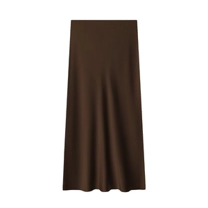 Detailed view of brown satin midi skirt texture with elegant draped silk-like finish