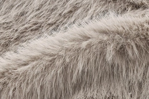 Close-up of the plush faux fur texture and soft khaki fibers of this fashion vest