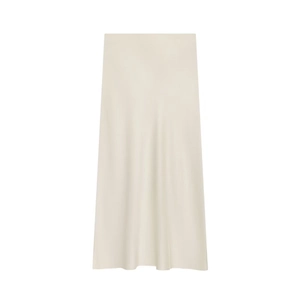 Detail of creamy satin midi skirt showing smooth silk-like texture and soft luster