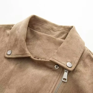 Close-up of khaki faux suede biker jacket featuring wide lapels and metallic snaps