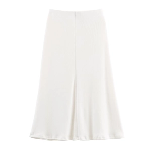 Detail of white midi skirt with vertical texture and A-line silhouette on a white backdrop