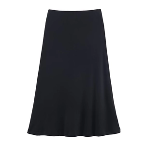 Detailed view of high-waist black midi A-line skirt with smooth texture and draped hem