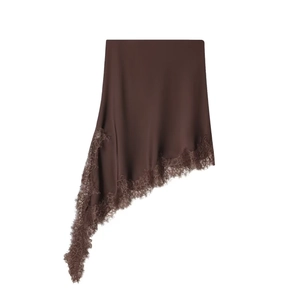 Detailed view of chocolate satin skirt featuring elegant eyelash lace trim and asymmetric hem
