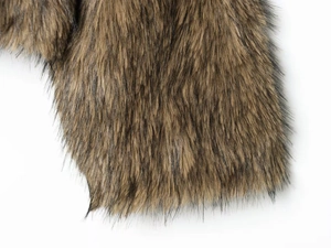 Close-up of premium brown faux fur jacket collar showing soft and fluffy texture