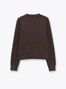 Detailed back view of dark charcoal knit sweater showing ribbed cuffs and fine texture
