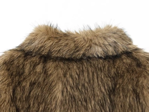 Detail of faux fur collar showing lush brown texture on a winter jacket coat