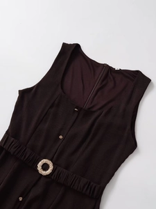 Detail of square neck midi dress featuring a pleated elastic waist and gold metal buckle