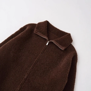 Women's dark brown boucle knit bomber jacket with half-zip collar and textured wool fabric