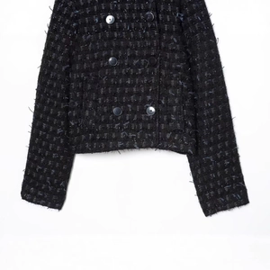 Elegant black tweed women jacket with double-breasted buttons in a cropped slim fit