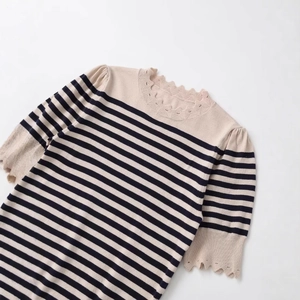 Short sleeve striped knit top with beige and navy patterns and hollow scalloped lace edges