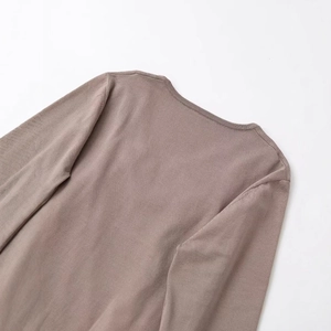 Classic earth-tone knit sweater with a detailed ribbed neckline and smooth shoulder seams