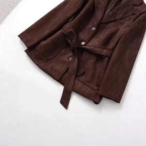 Classic dark brown faux suede jacket with waist belt and notched lapels in flat lay view