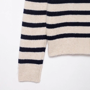 Minimalist navy striped crewneck knit sweater with classic ribbed cuffs and hem details