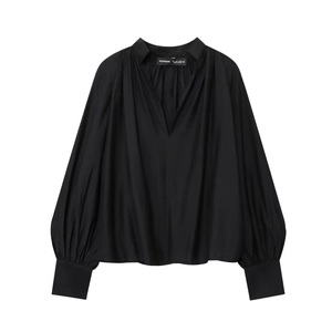 Elegant black lantern sleeve blouse for women featuring a deep V-neck and pleated texture