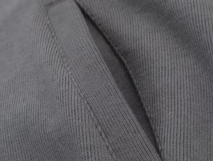 Detail shot of the fine ribbed texture and precise stitching on gray knit lounge set