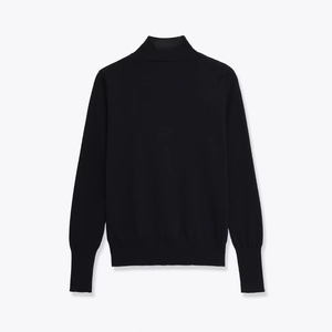 Minimalist black turtleneck knit sweater with long sleeves and ribbed cuffs on white background