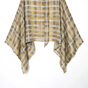 Plaid poncho top for women with asymmetric cut in coffee yellow and beige weave